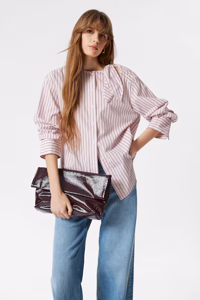 CAMISA COM PORMENOR DE Nó