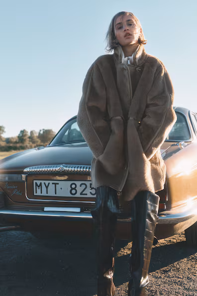 Пушистое длинное пальто