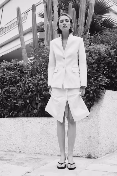 Юбка с кружевной отделкой и бахромой