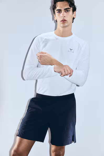 Шорты спортивные средней длины с технологией DRYMOVE™- Заказать в России