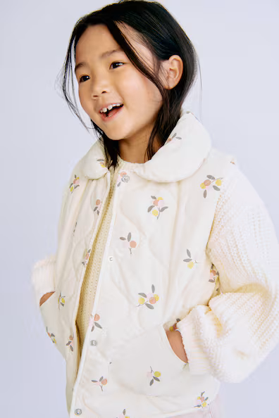 Пуховой жилет- Заказать в России