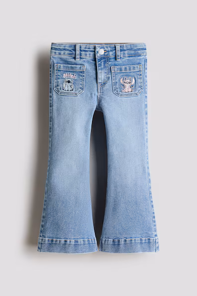 Джинсы с вышитыми мотивами и расклешёнными штанинами- Заказать в России