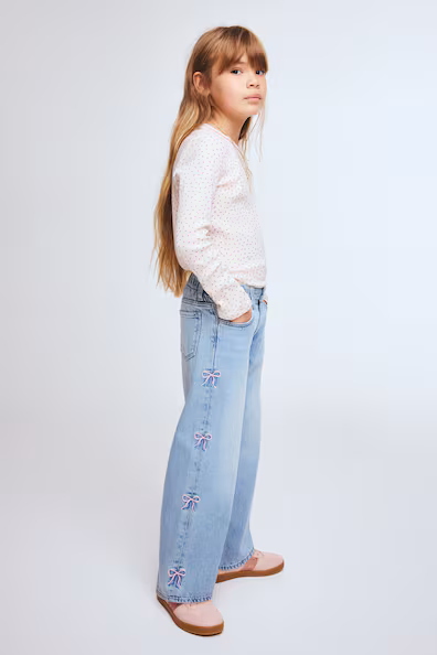 Джинсы с широкими ножками с узорами- Заказать в России