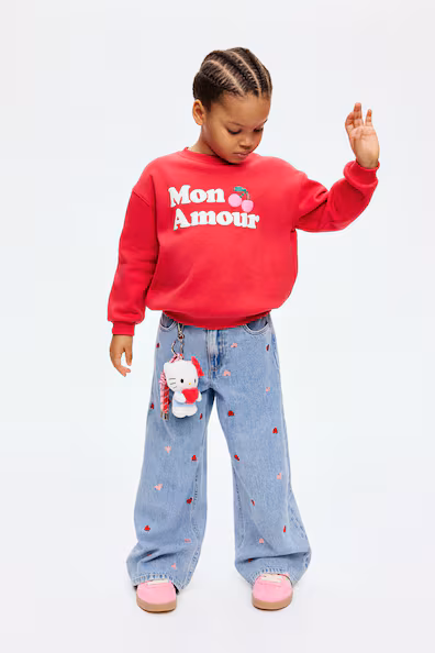 Джинсы с широкими штанинами и узором сердец