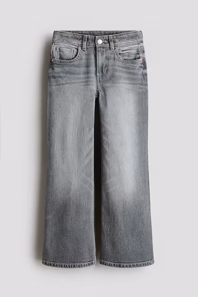 Джинсы свободного кроя с буткатингом- Заказать в России