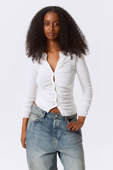 Кардиган с пуговицами и защипами