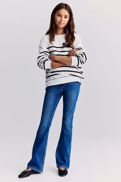 Джинсы с широкими штанинами низкой посадки- Заказать в России