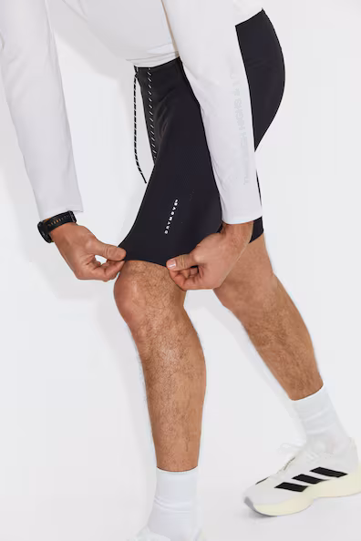 Короткие беговые леггинсы из быстросохнущей ткани- Заказать в России