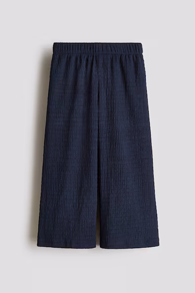 Широкие складки брюки- Заказать в России