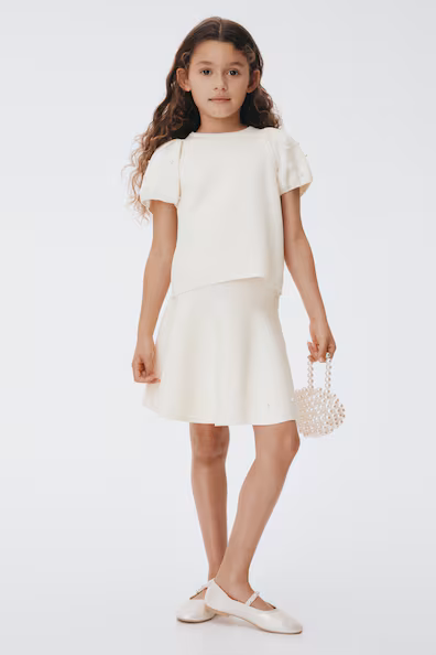 Юбка из тонкой вязаной ткани с бисером- Заказать в России