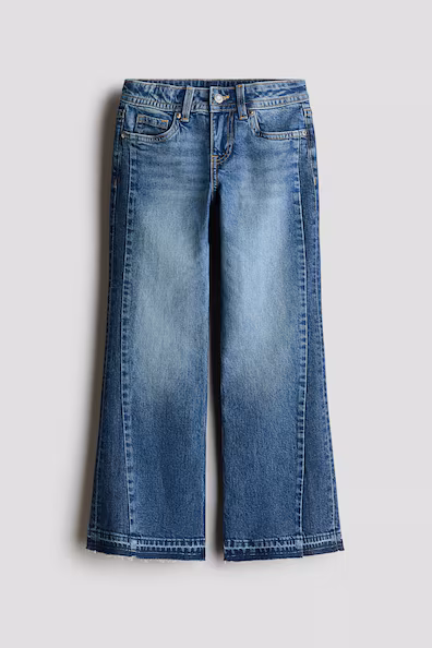 Джинсы свободного кроя с расширенными штанинами и зауженнымнизом- Заказать в России