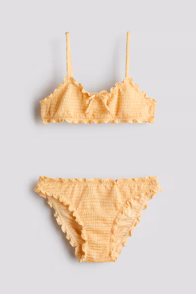 Бикини с обработкой каймой overlock- Заказать в России