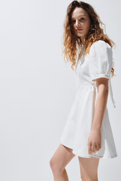 Джинсовое платье с расклешенной юбкой- Заказать в России