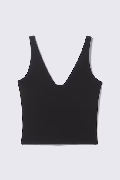 Короткий спортивный топ с глубоким вырезом- Заказать в России