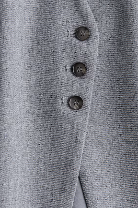 Длинный жилет