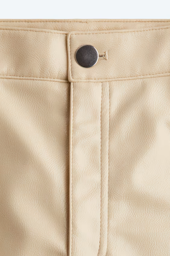 Брюки из покрытой ткани