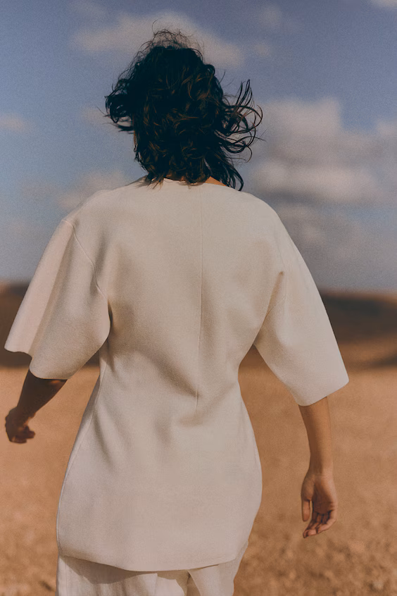 Свитер с карманами