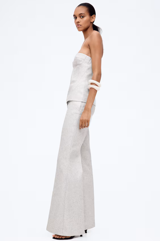 Брюки-клеш с защипами