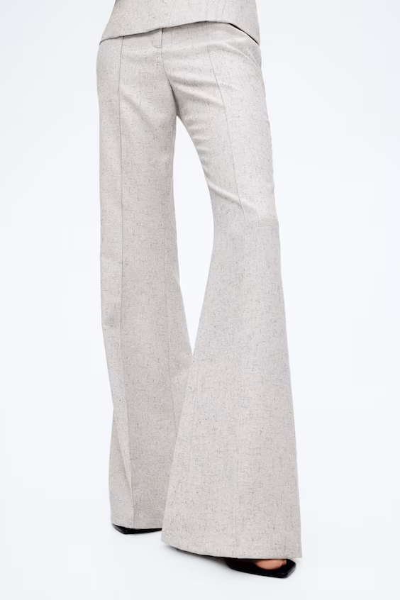 Брюки-клеш с защипами