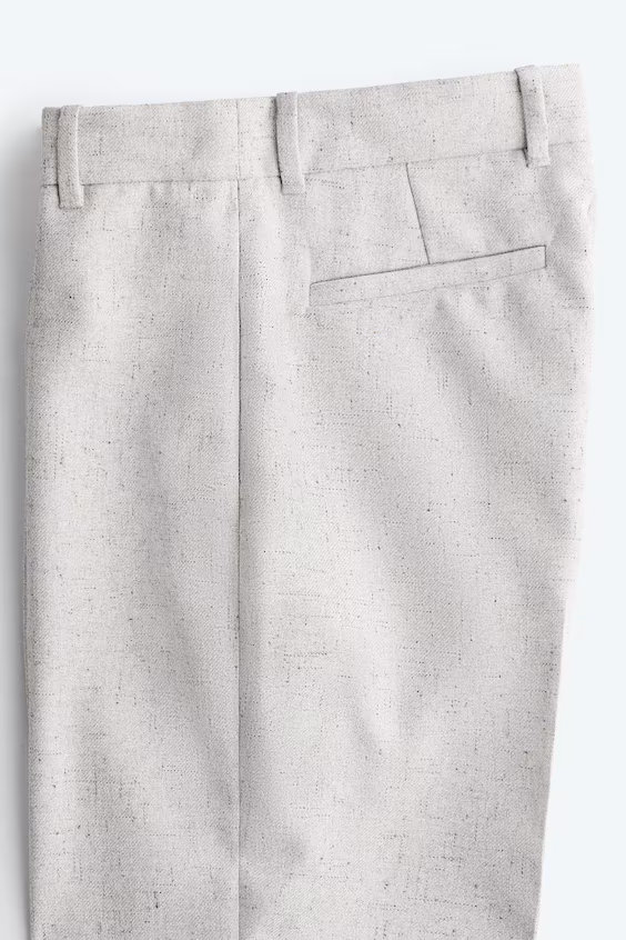 Брюки-клеш с защипами