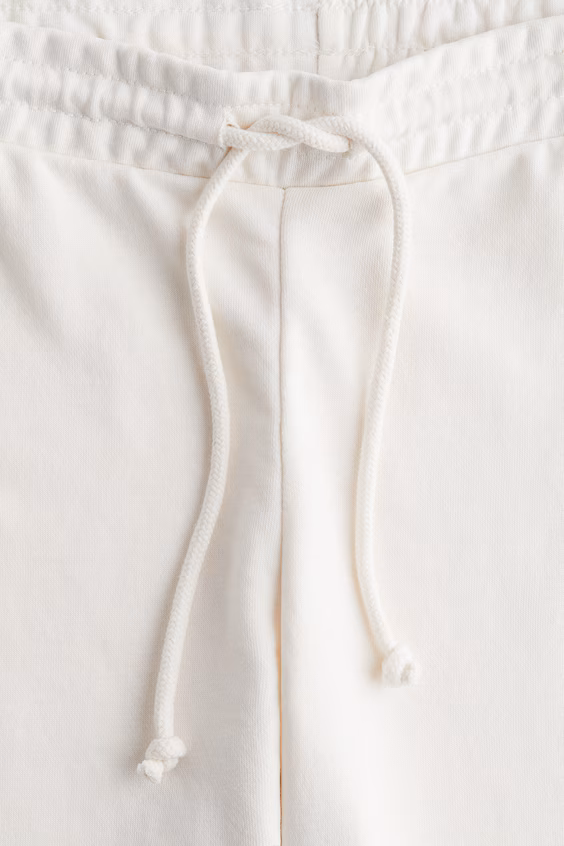 Брюки-джоггеры с расклешенным низом