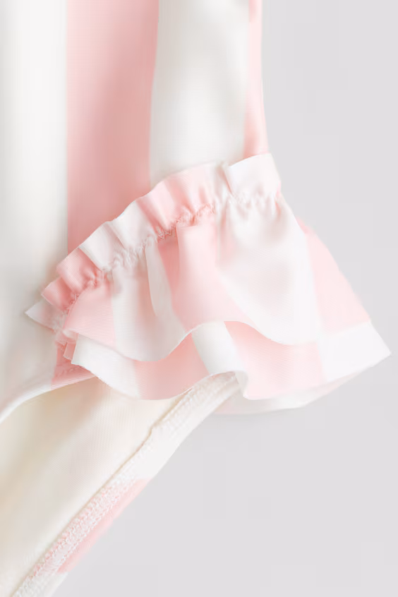 Купальник с оборками и принтом