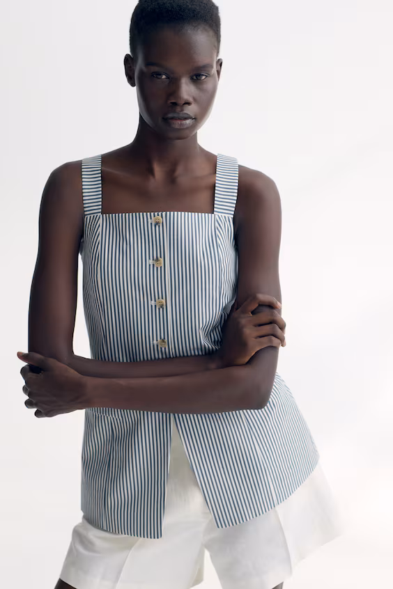 Длинный жилет