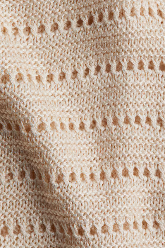 Платье из вязанного трикотажа с крупной вязкой