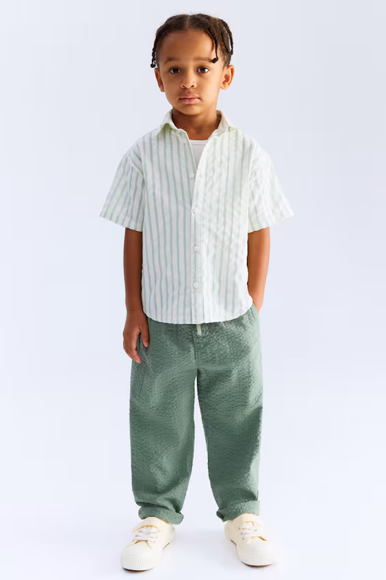 Брюки из тонкого хлопка с различными складками