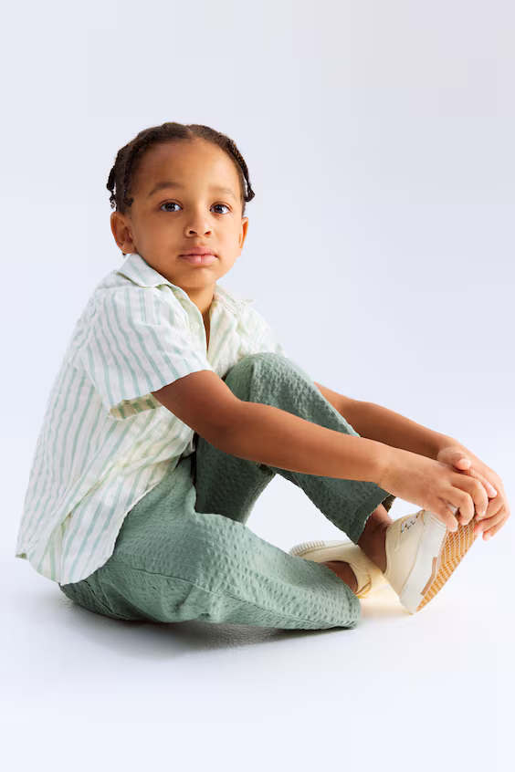 Брюки из тонкого хлопка с различными складками