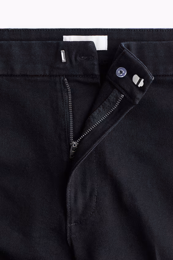 Джинсы с высокой посадкой и расклешенным низом