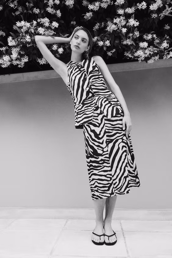 Длинный жилет