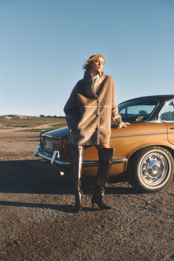 Пушистое длинное пальто