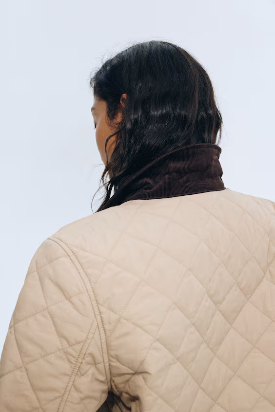 Стеганое пальто с вельветовым воротником