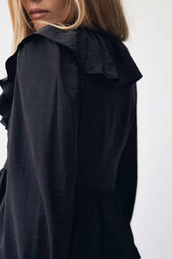 Блуза с оборками