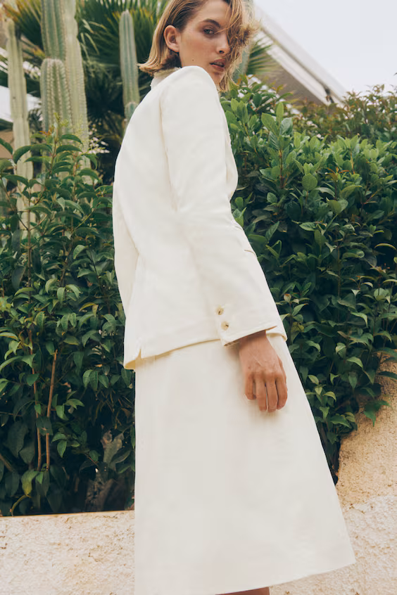 Юбка с кружевной отделкой и бахромой