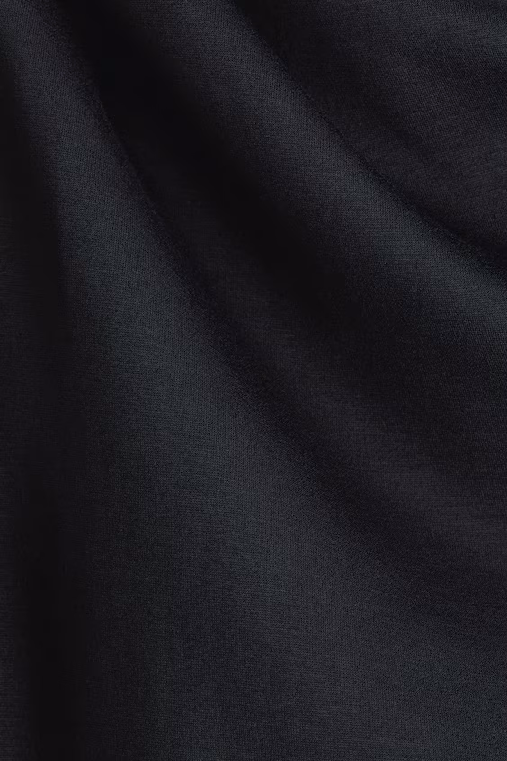 Свитер асимметричного кроя