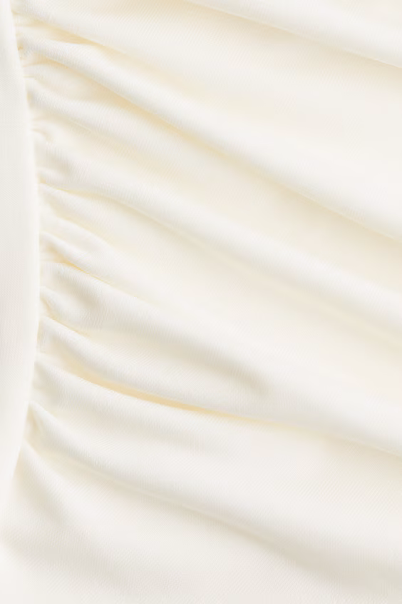 Свитер с драпировкой