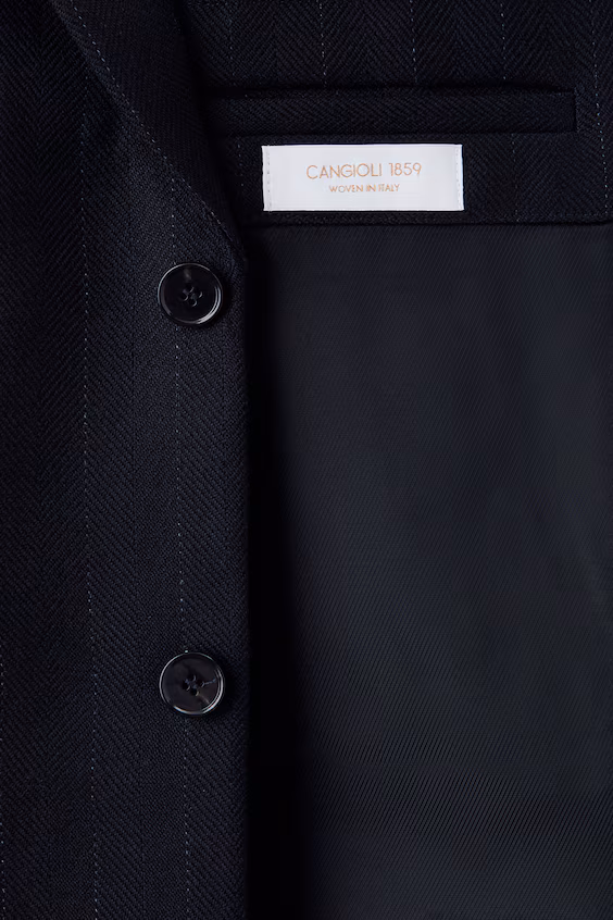 Длинное однобортное шерстяное пальто