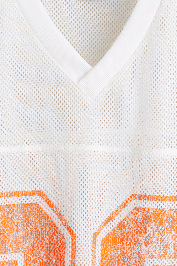 Футболка oversized fit из сетчатого материала с принтом