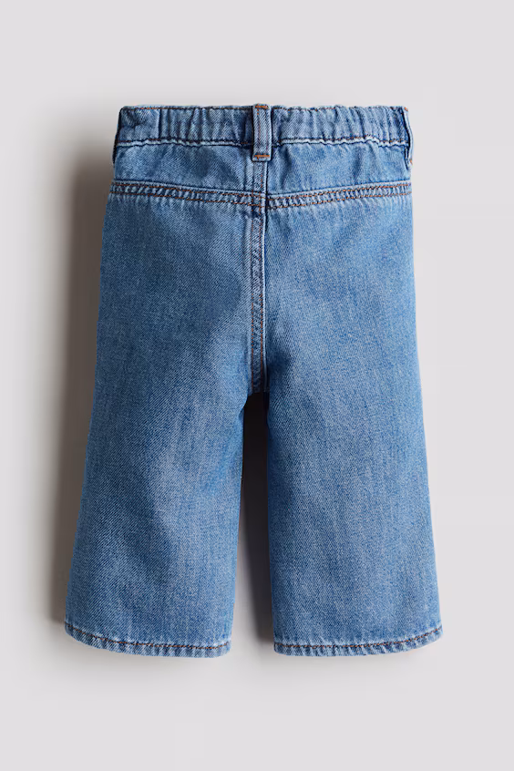 Джинсы с расклешенными штанинами