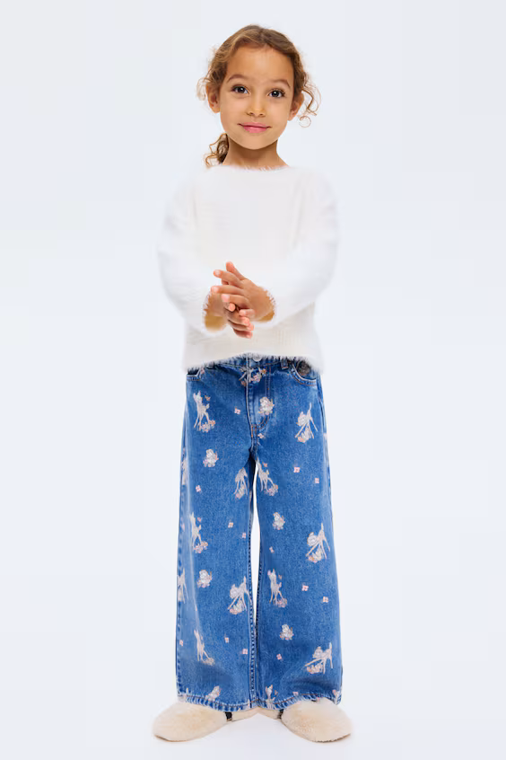 Джинсы с широкими штанинами в принт