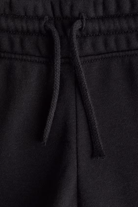 Брюки джоггеры с расклешенными штанинами