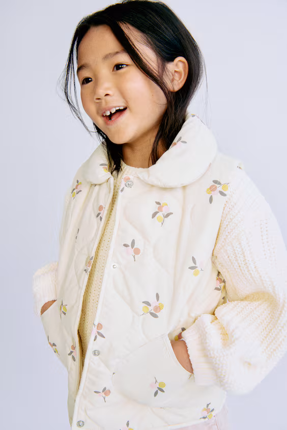 Пуховой жилет