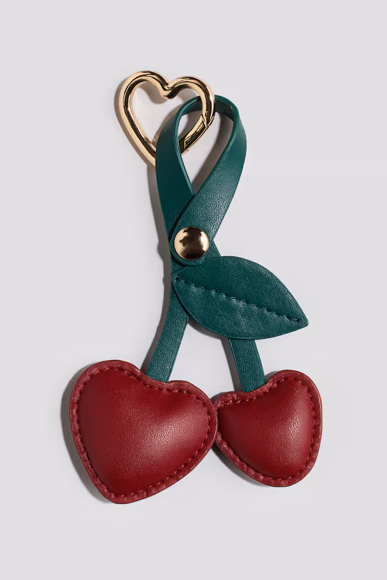 Декоративный подвесной элемент для чемодана