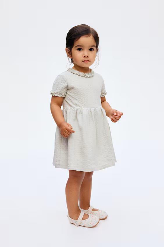 Платье вязаное с жаккардовым узором и оборками