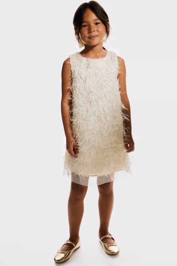 Платье с блестящими кисточками