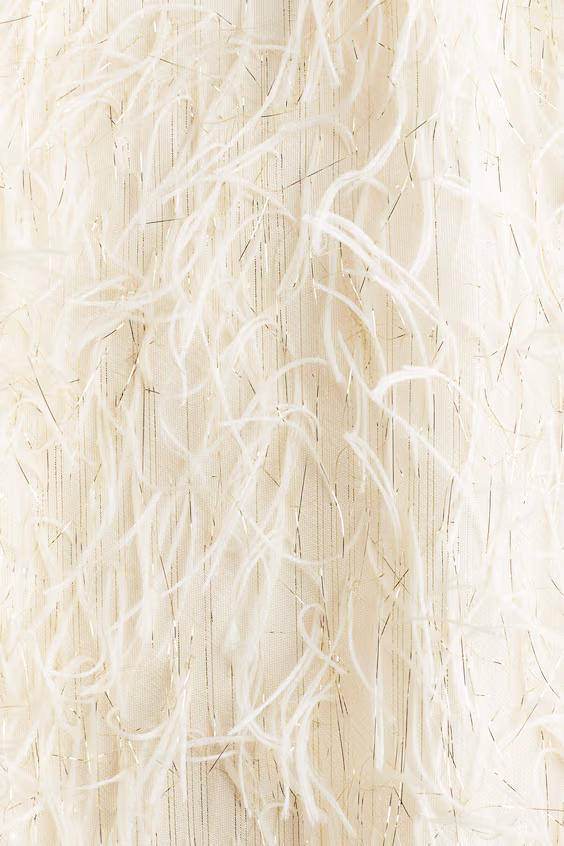 Платье с блестящими кисточками