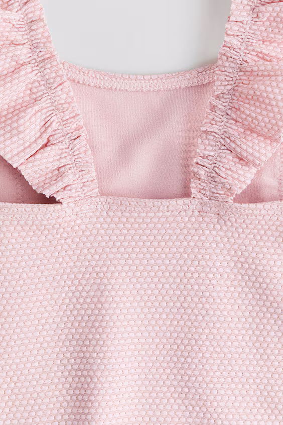 Купальный костюм с оборками