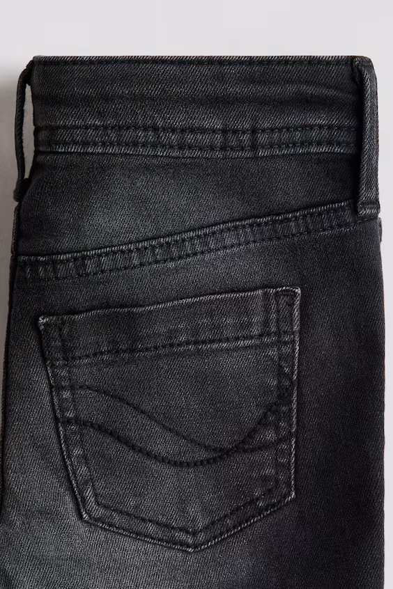 Джинсы с расклешенными штанинами